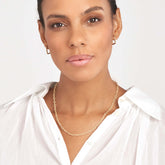 14k Yellow Gold Twisted Forzentina Chain Necklace on woman's neck